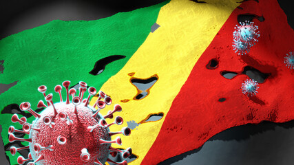 Covid in Congo - coronavirus attacking a national flag of Congo as a symbol of a fight and struggle with the virus pandemic in Congo, 3d illustration