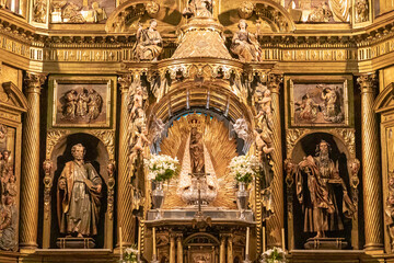 Fototapeta na wymiar Ponferrada, Spain. Statue of the Virgen of La Encina inside the Basilica of La Encina, a Renaissance and Baroque Christian church, patron saint