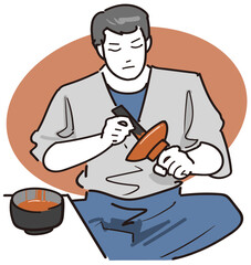 職人-食器に光沢を付けるために塗装する