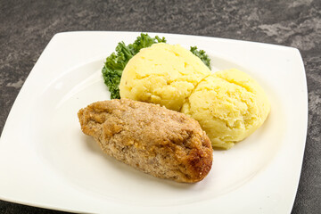 Crispy chicken cutlet with mashed potato