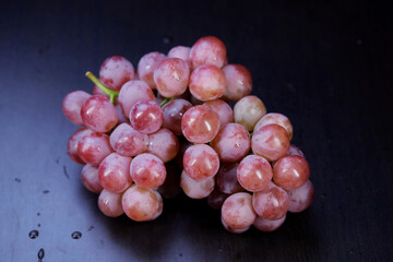 bunch of fresh grape isolated on black background