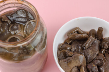 Botulism, food poisoning from canned foods concept. Glass jar an