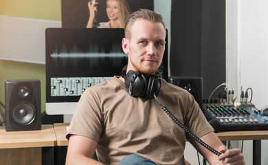 Fototapeta premium Sound Engineer man Mixer audio studio recording