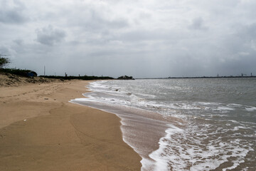 Arabian Ocean waves with foam of blue and turquoise color. Sea foam creating amazing shapes and patterns like glacier. Abstract Arabian Ocean blue water with white wave for background.