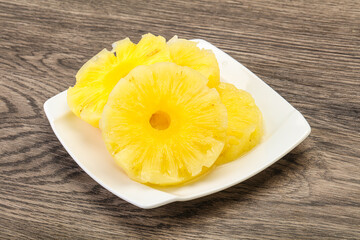 Sweet pineapple rings in the bowl