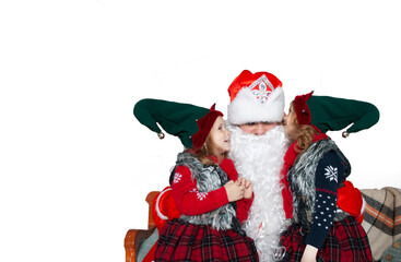 children elves sitting on the lap of santa claus whispering their desires in the ear. isolated on white background.
The women are shouting joyfully. Ukraine Kharkiv 07.12.