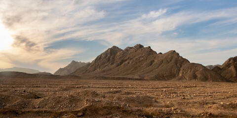 Hot desert with mountains with dramatic sky in Egypt, Africa