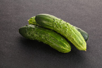 Fersh juicy green cucumbers heap