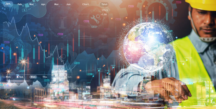 concept of the world of business industry An engineer shows a financial industry business graph with world and capital cities overlapping with a financial graph. Image from space furnished by NASA