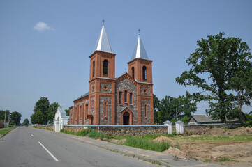Fototapeta na wymiar Church of St. Simeon and Tadeusz in Lazduny 1904-10.
