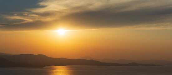 Beautiful sunset over Aegean Sea in Pelion Peninsula, Greece.