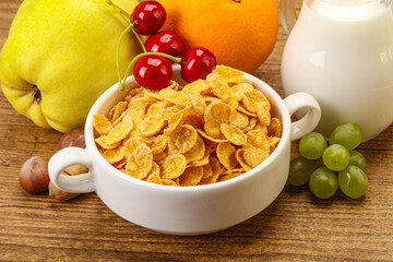 Breakfast with corn flakes and milk