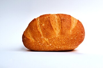 a large loaf of bread isolated on a white background