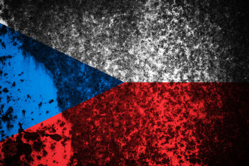 Old cracked wall with the flag painted