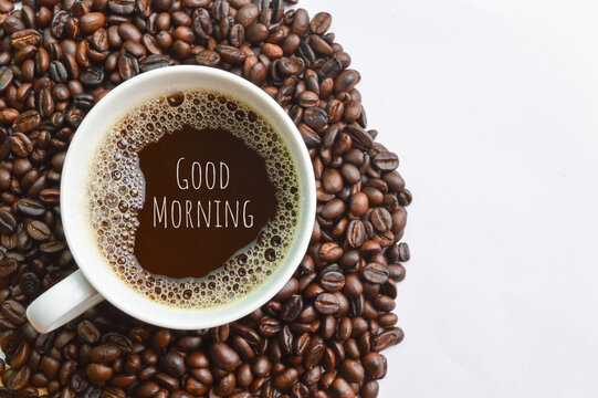 Coffee bean roasted and a cup of coffee with text GOOD MORNING