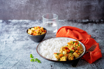 Curry chicken with rice in a plate