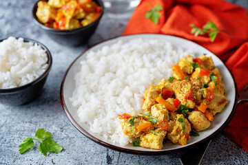 Curry chicken with rice in a plate