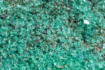 green background of broken glass
