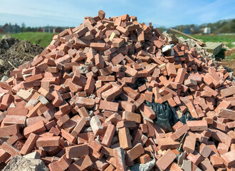 Pile of old house bricks dumped after building improvement work