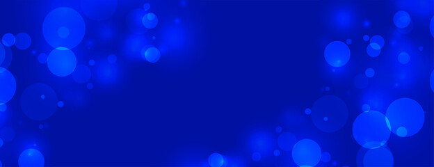 Obraz na płótnie Canvas dark blue background with bokeh lights