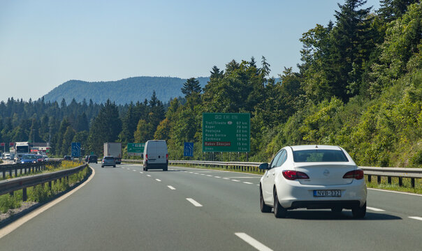 Slovenia - August 10, 2021: A picture of a highway and surrounding landscape in Slovenia.