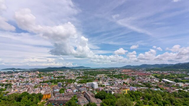 Timelapse of Khao rang hill view point to see Phuket city Thailand Amazing cityscape view point Beautiful clouds flowing in the blue sky background