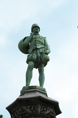 Fototapeta na wymiar Brussels, Belgium. Statue of the Representative of the Crafts Guild in Petit Sablon Square 