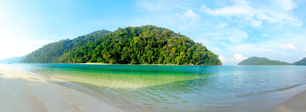 sea, sand, sky with summer blue and green sea , in island with forest , long baech Panorama