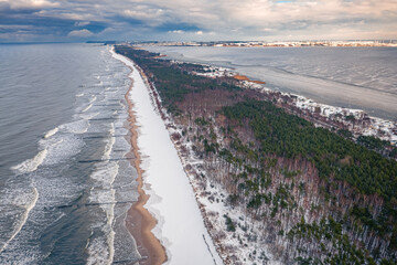 Hel peninsula and snowy beach. Baltic Sea at winter, Poland.