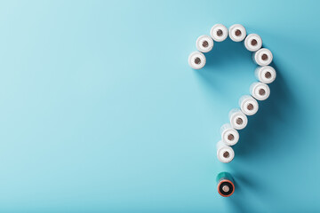 AA rechargeable batteries in the form of a question mark on a blue background with free space
