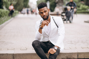 Obraz premium African american man in white jacket