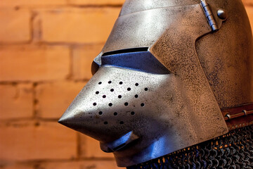 Old historical medieval iron knight helmet armor for ancient warriors protection in combat....