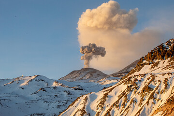 Eruption of Nevados de Chillán Volcano Chile South America at the sunset 