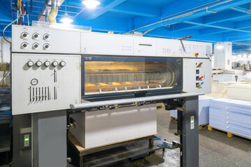 The offset press in the production process in the printing factory