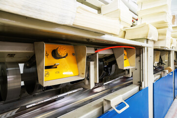 The offset press in the production process in the printing factory
