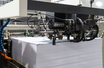 The offset press in the production process in the printing factory