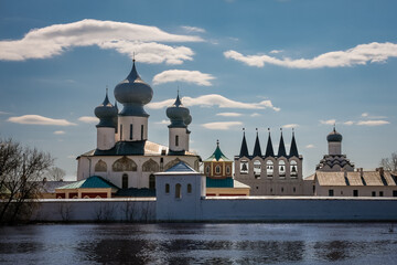 View to the monastery over Tikhvinka river