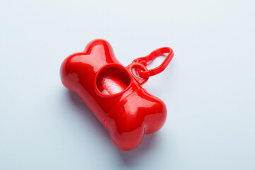 Dog cleaning package. Case for storing packages in the form of a red bone. Animal cleaning.