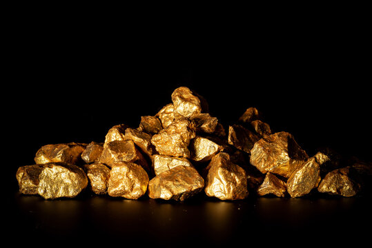 Gold concept, close-up of large gold nuggets