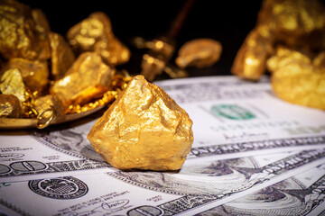 Close up of gold and US dollar, theme of financial concept