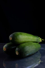 zucchini zucchini on black and white background. Minimalistic concept