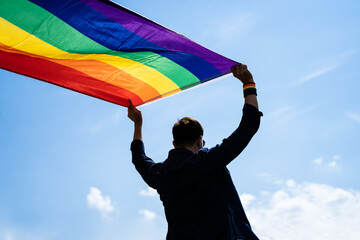 LGBT March And Pride Celebration With Rainbow Flag