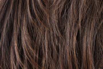 Naklejka premium Texture of dark brunette straight hair care or extension concept