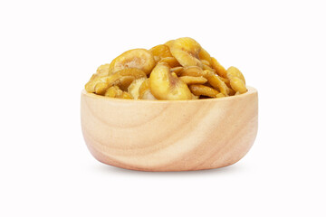 Nuts or Salted broad beans or vicia faba salt baking, in wooden cup. Crispy it's a snack. It is popular at parties and as a light snack. Isolated on white background cutout. 