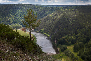 Fototapeta na wymiar View of the Belaya river valley. Bashkiria National Park, Bashkortostan, Russia. Rocky coast, forest.