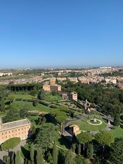 Aerial view of green Vatican city gardens and Mater Ecclesae Monastery. View from Basilica di San Pietro (St. Peter's Basilica). Vatican city, Vatican.