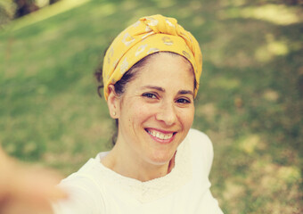 Outdoor portrait of 50 years old woman