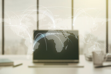 Double exposure of abstract digital world map with connections on laptop background, research and strategy concept