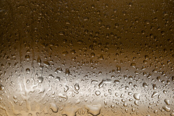 Drops of water on the surface of the metal for the background