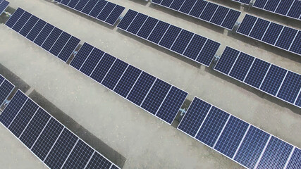 aerial drone top view of solar energy panels or photovoltaic PV module in the desert.  - 452169115